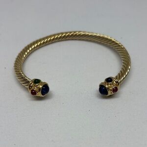 Elegant Gold-Toned Twisted Bangle with Multicolor Cabochon ‘Jewels’